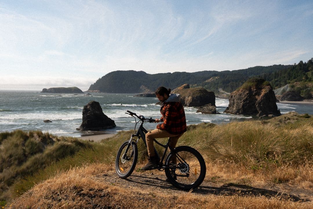 Rider on a Surface 604 eBike overlooking the coast
