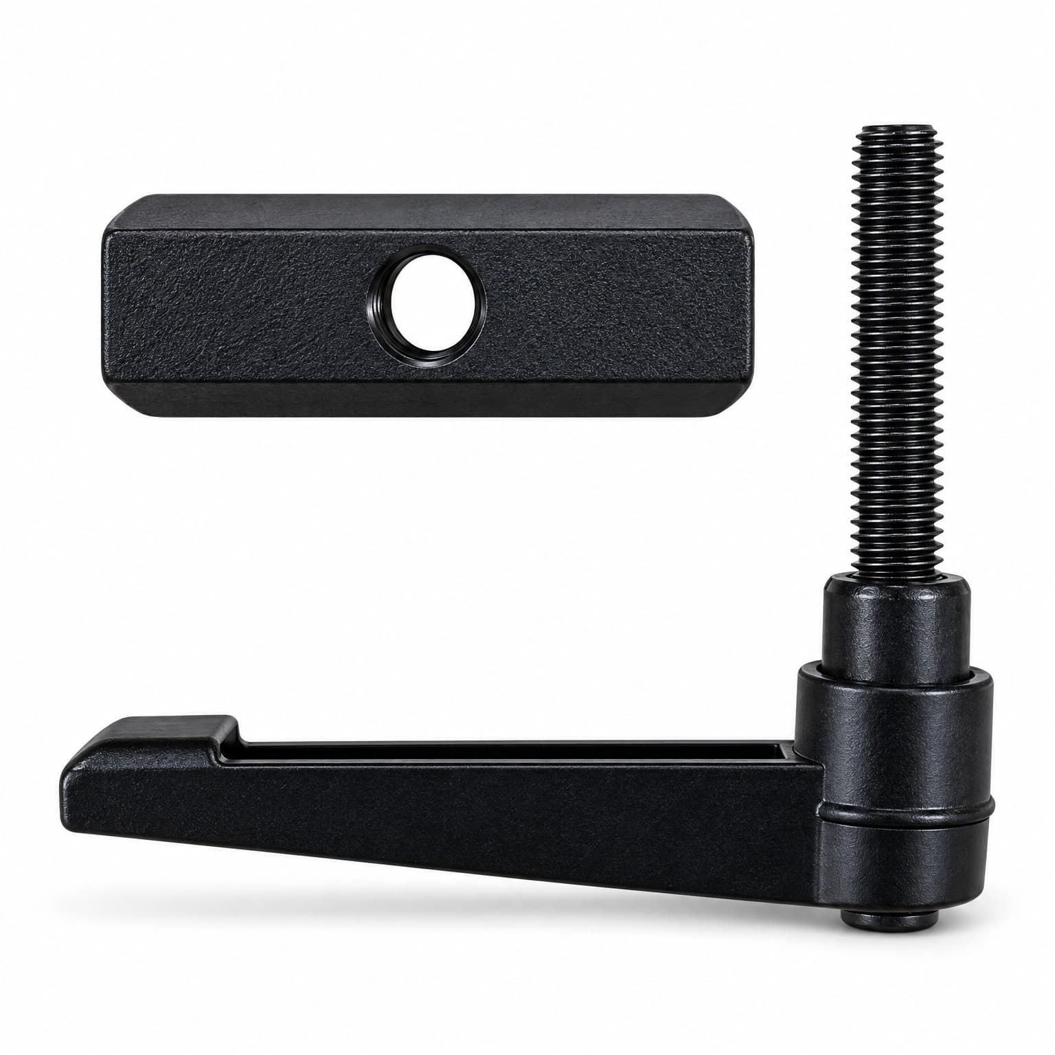 Top view of the black lever bolt and the rectangular clamp block with a threaded hole on a wooden table