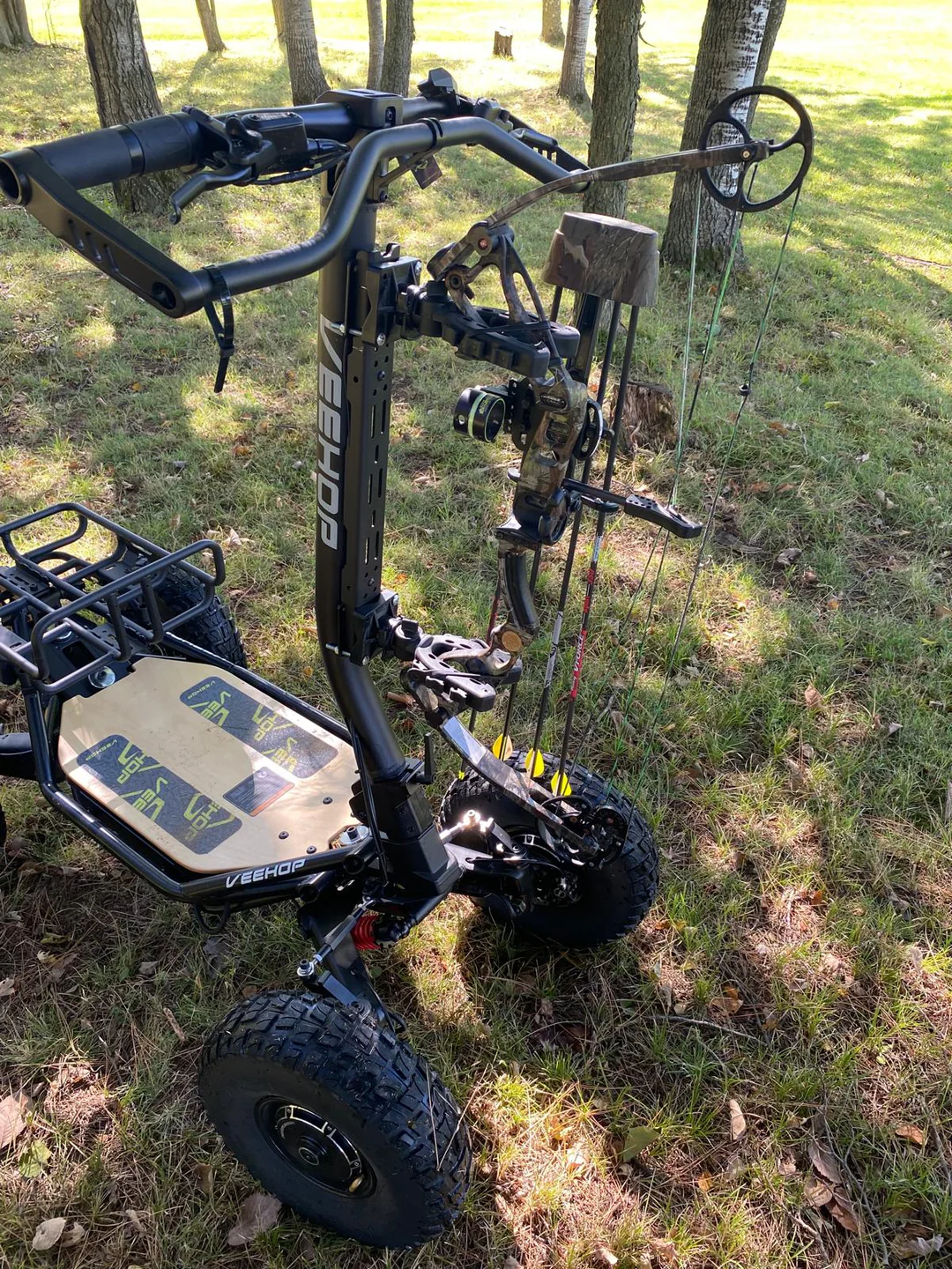VEEHOP 4WD loaded with archery gear in the woods